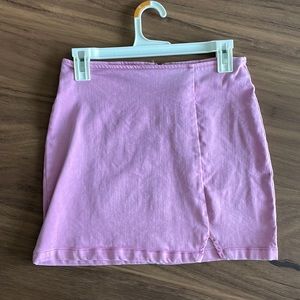 Pinkish/purple jean material skirt with zip back and small front slit
